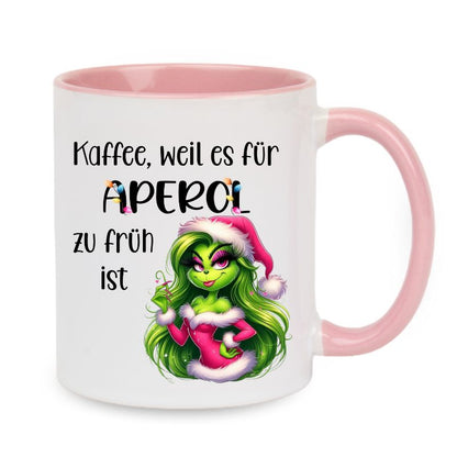 Tasse "Kaffee, weil es für Aperol zu früh ist" Lady Grinch in Rosa